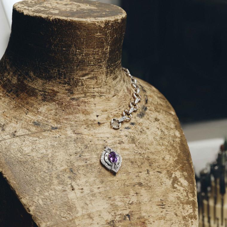 The crafting of the 2.70-carat oval purple sapphire