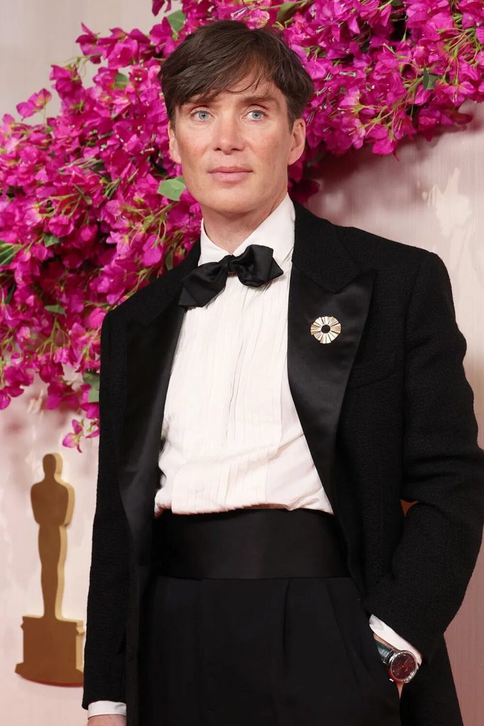 Cillian Murphy Oscars 2024 Red Carpet Omega watch and gold brooch